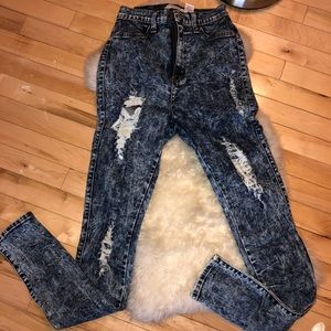 Very destroyed blue jeans